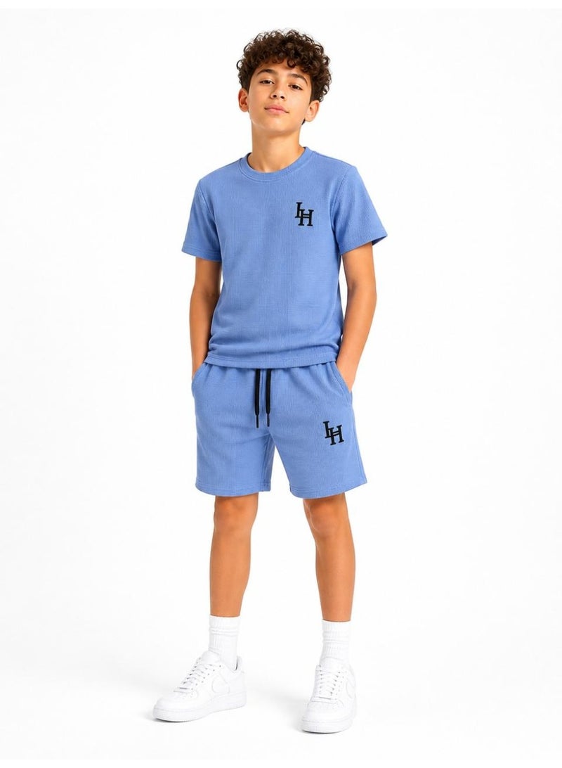 Cesar boys two-piece suit: a short-sleeved t-shirt and shorts - Image 1