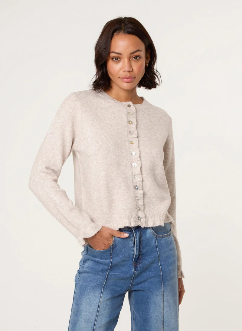 بلو فانيلا كارديجان مزين بكشكش