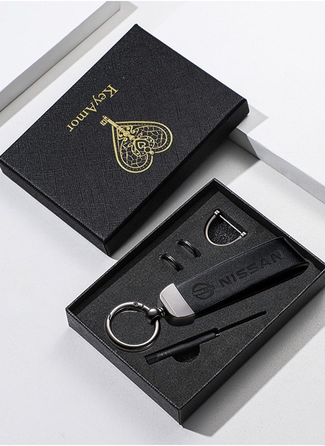 KeyAmor Luxurious Leather & Metal Keychain – Black Edition with Nissan Logo Elegant black metal and leather keychain car key holder for adults. Stylish car keychain with 3 key rings, featuring the iconic Nissan logo, perfect as a fancy gift or car accessory. Designed in a sleek black colour for a refined and modern look, it offers 360-degree rotation for added convenience, is suitable for both men and women, and comes beautifully packaged in a fancy gift box.  - Image 2