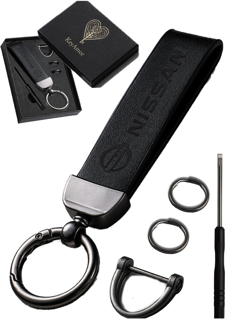 KeyAmor Luxurious Leather & Metal Keychain – Black Edition with Nissan Logo Elegant black metal and leather keychain car key holder for adults. Stylish car keychain with 3 key rings, featuring the iconic Nissan logo, perfect as a fancy gift or car accessory. Designed in a sleek black colour for a refined and modern look, it offers 360-degree rotation for added convenience, is suitable for both men and women, and comes beautifully packaged in a fancy gift box.  - Image 1