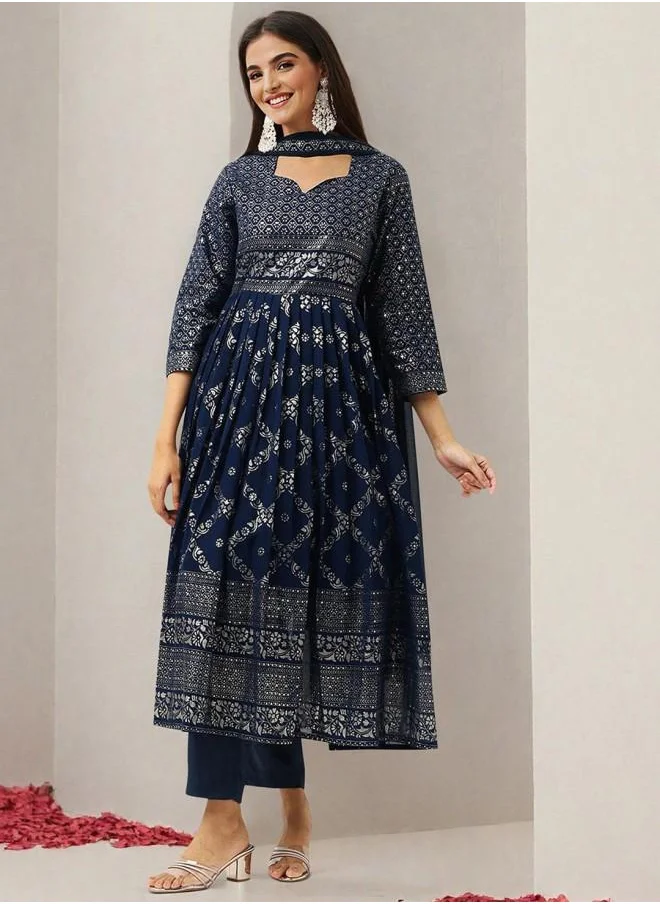 آي شين Tunic Women Peacock Blue Georgette Kurta Set with Embroidered pattern Tunic and Palazzo features a Round neckline and Three-Fourth Sleeve secured with Elastic closure and styled in Straight Fit ideal for Festive moments — exude elegance in every glance.