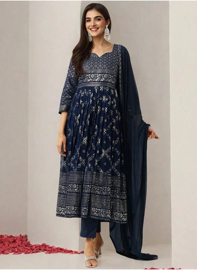 ISHIN Tunic Women Peacock Blue Georgette Kurta Set with Embroidered pattern Tunic and Palazzo features a Round neckline and Three-Fourth Sleeve secured with Elastic closure and styled in Straight Fit ideal for Festive moments — exude elegance in every glance.