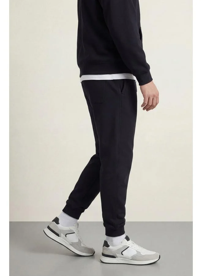 mmetalic Men’s Black Regular Fit Sweatpants with Elastic Cuffs and Detailed Back Pocket Label