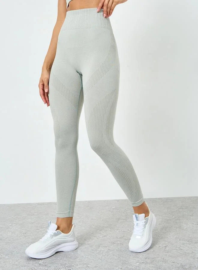 Styli Active  Grey Tonal Jacquard Low Back Sports Bra and Leggings Set for Women | Best Price UAE