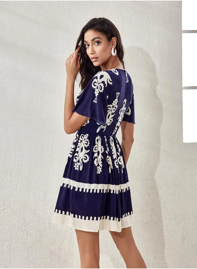 لوكس ويف Printed V Neck A-Line Midi Dress by Styli