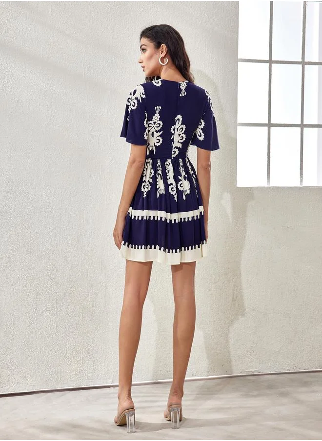 لوكس ويف Printed V Neck A-Line Midi Dress by Styli