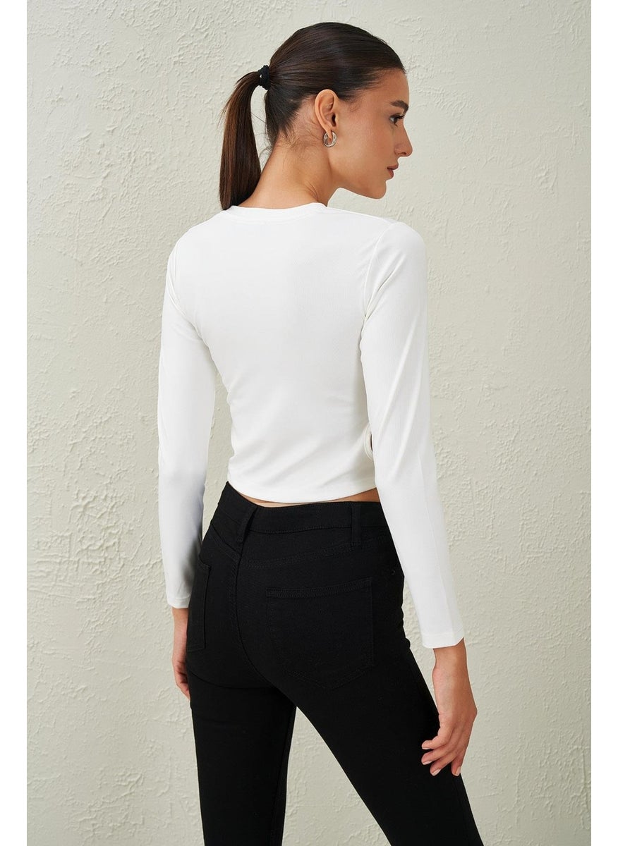 Tena Women's Ecru Crew Neck Scuba Blouse with Ring Detail on the Sides  - Image 5