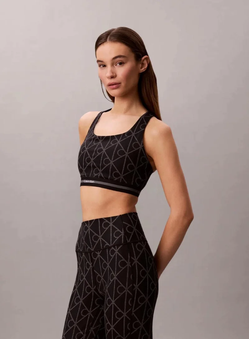 Calvin Klein 20282 DOTTED EMBLEM LARGE BLACK Icon Sport Medium Impact Sports Bra for Women | Best Price UAE