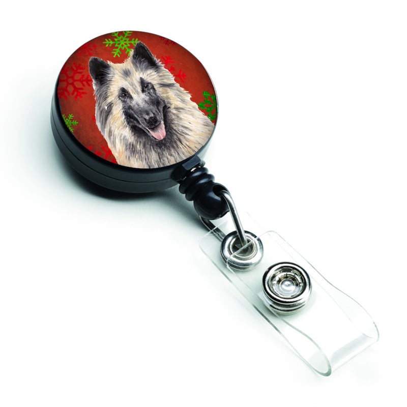 ""Caroline's Treasures Belgian Tervuren Red & Green Snowflake Christmas Badge Reel  Multicolor (SC9432BR)""