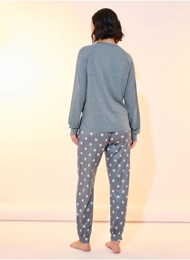 Plain Long Sleeve T-Shirt & Star Print Cuffed Pyjama Set - pzsku/Z42340BE7BC62212210F9Z/45/_/1728647024/066a968f-cc2d-457e-9772-5e38b7fa7d2d