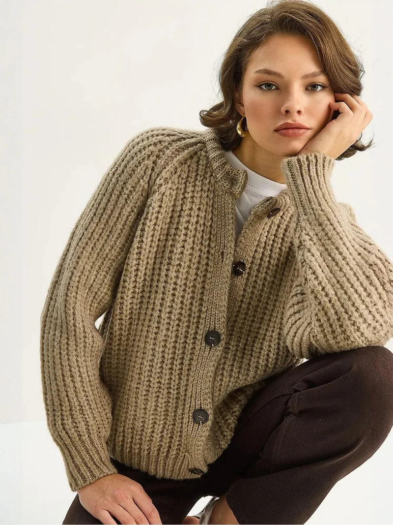 بيانكو لوتشي كارديجان لوكسي محبوك بأزرار