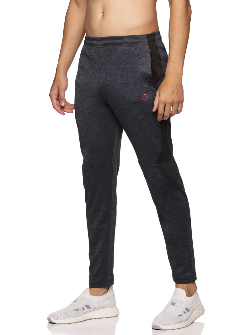 DOMIN8 Men Comfort Fit Track Pant| Solid Stretchable Track Pant with One Side Zipper Pocket and Inside Drawstring (in, Alpha, L, Regular, Black) - Image 1