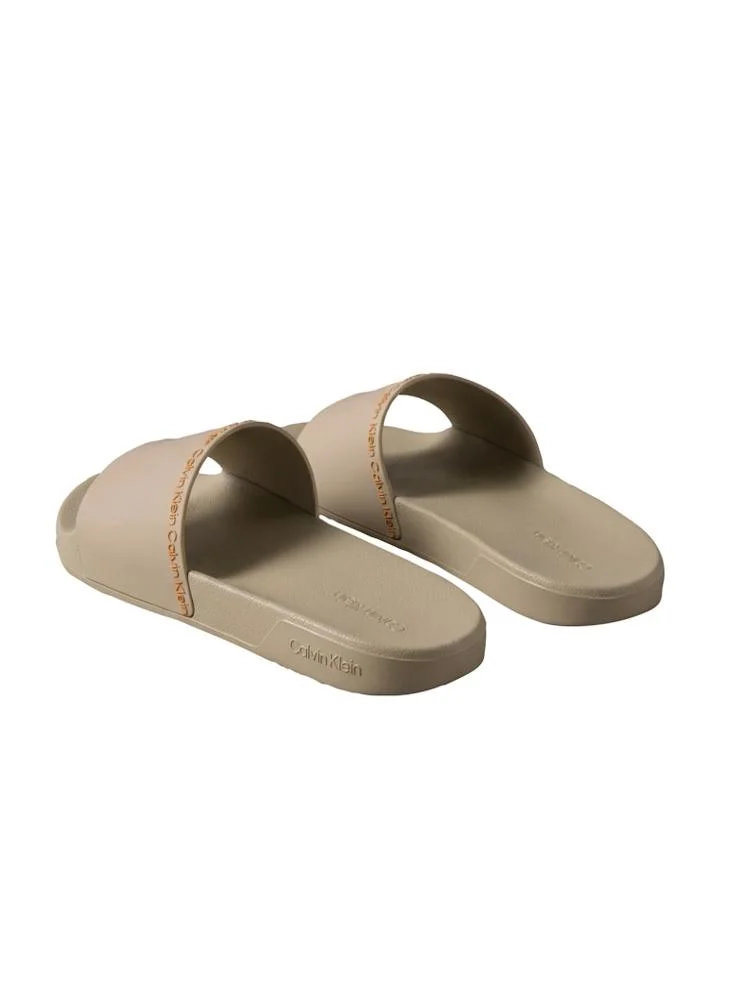 Calvin Klein Nomad/Vivid Tangerine Contoured Logo Sliders for Men | Best Price UAE
