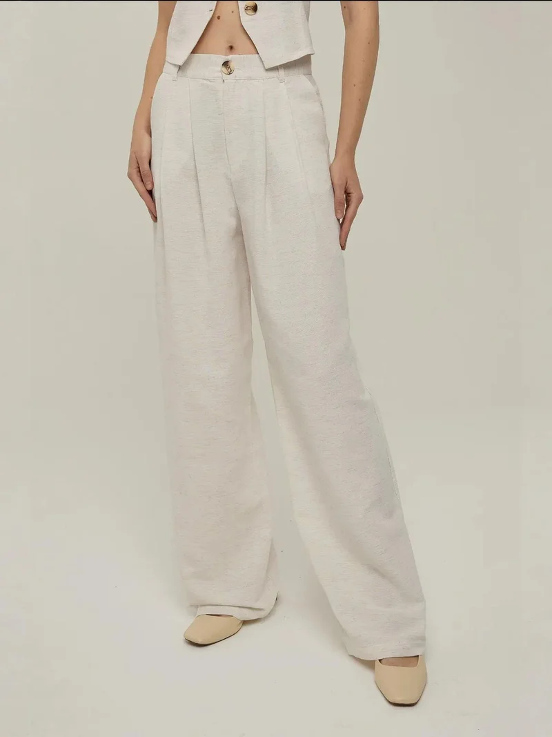 زوبعة بنطلون واسع الساق بكسرات بنسيج الكتان