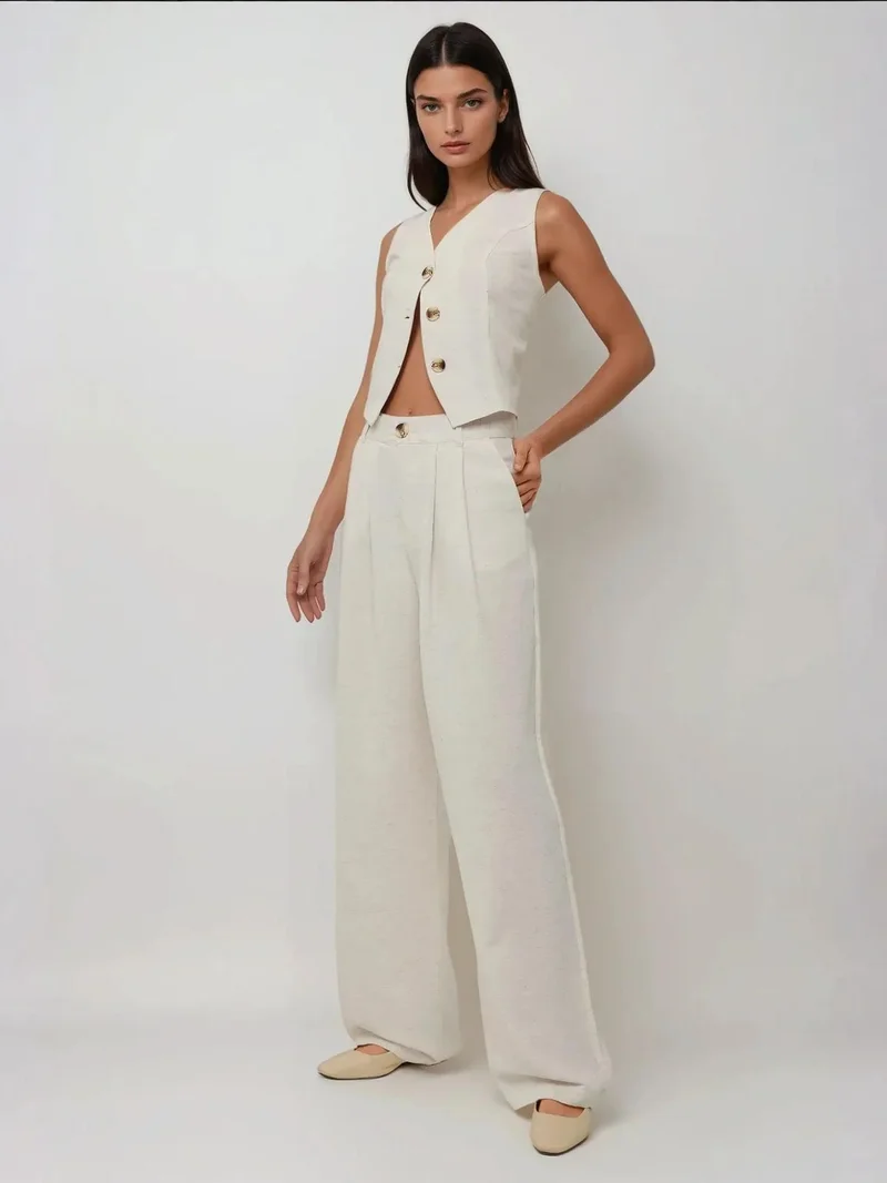 زوبعة بنطلون واسع الساق بكسرات بنسيج الكتان