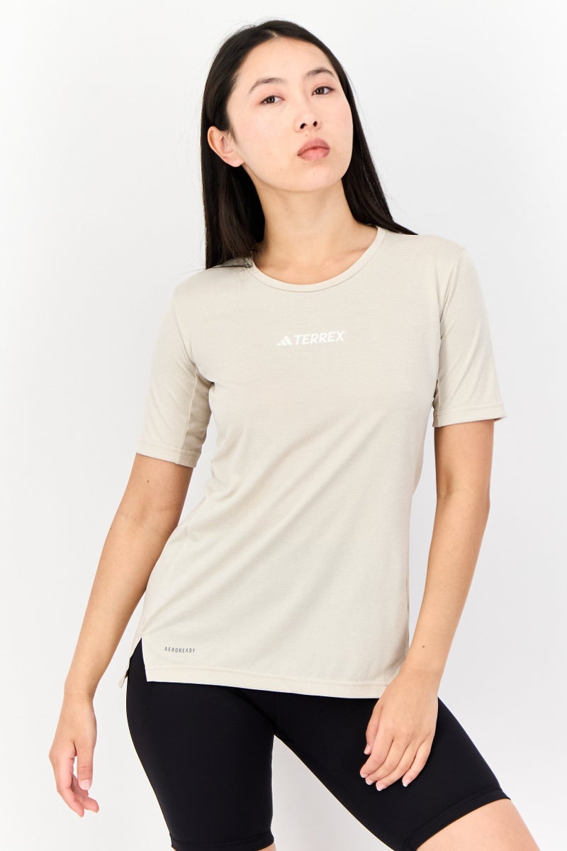 Adidas تي شيرت رياضي نسائي بأكمام قصيرة مناسب في الهواء الطلق، بيج - Image 1