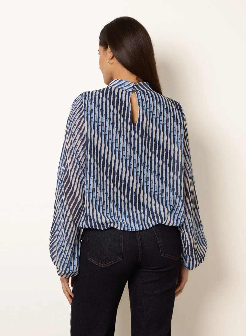بلو فانيلا Printed High Neck Puffball Blouse