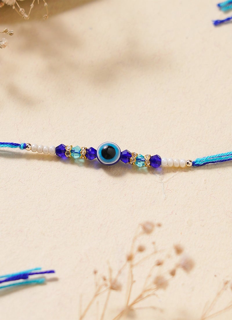 Madhoor Evil Eye Crystal Rakhi for Brother Blue White Designer Raksha Bandhan Thread ,Premium Handmade ,1 Piece-44 CM - Image 1