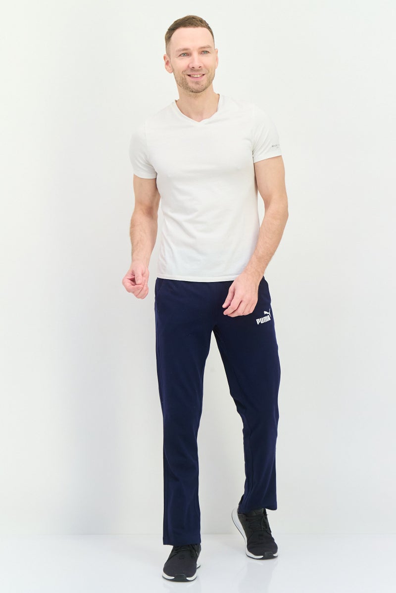 PUMA Men Sportswear Fit Drawstring Outdoor Track Pants, Navy/White - Image 4