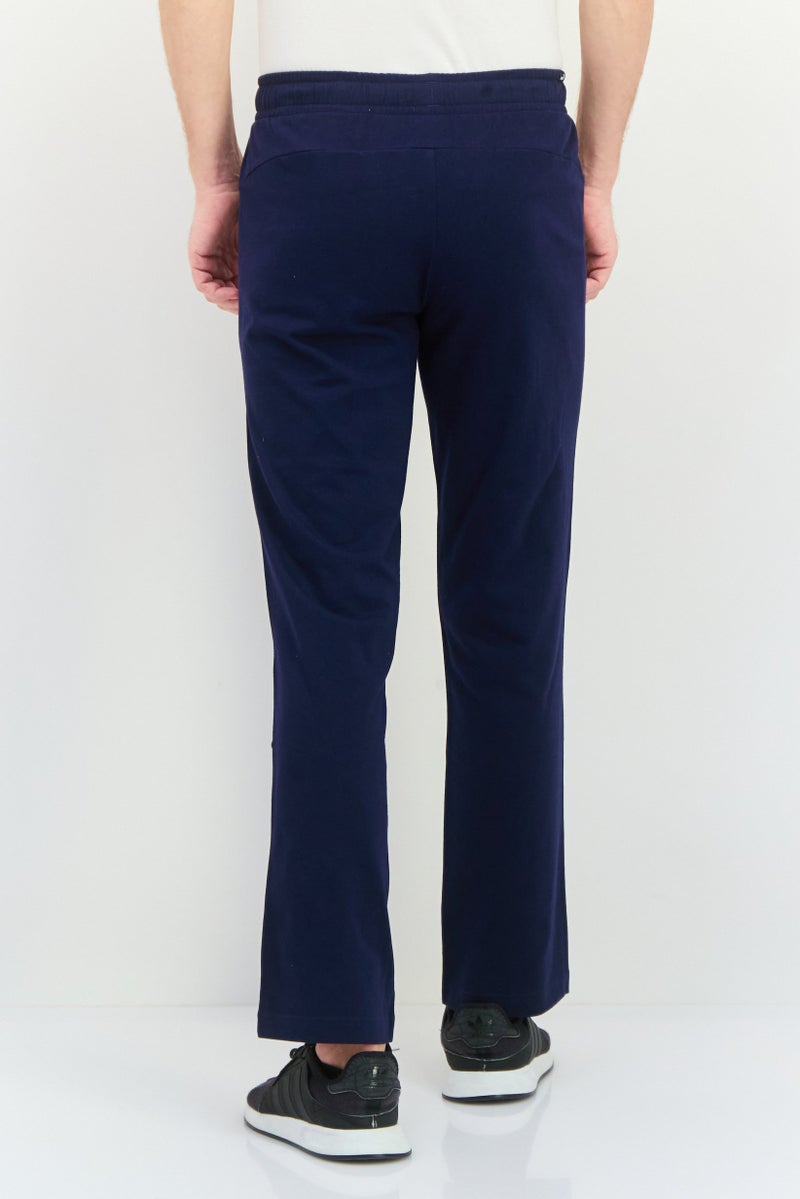 PUMA Men Sportswear Fit Drawstring Outdoor Track Pants, Navy/White - Image 3