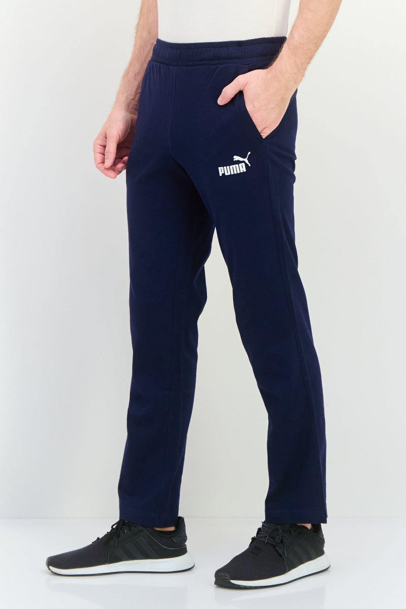 PUMA Men Sportswear Fit Drawstring Outdoor Track Pants, Navy/White - Image 2