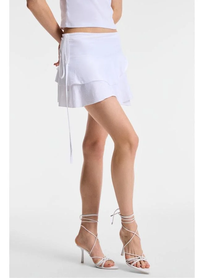 Ethiquet SARELIN Women's Ruffled Envelope Side-tied Mini White Skirt.