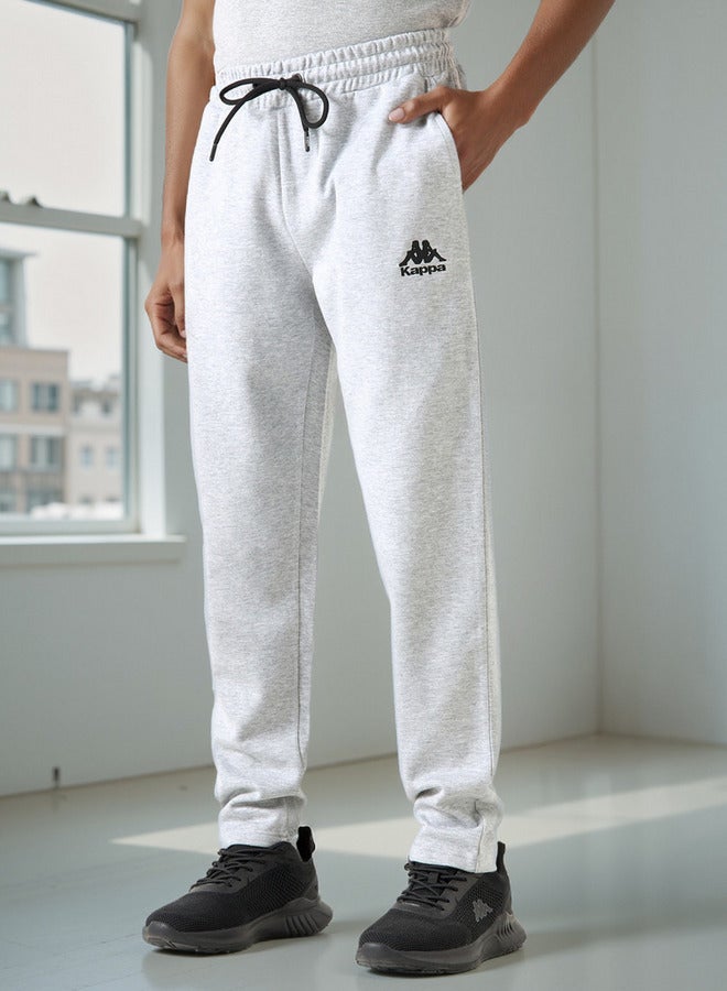 Kappa بنطال كابا كامل الطول بلون موحد مع تفاصيل جيب وحبل سحب - Image 1