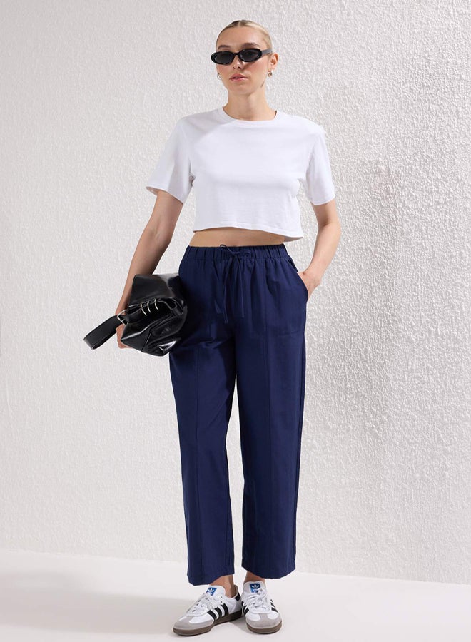 trendyol Navy Blue Matte Textured Elastic Waist Trousers - Image 1