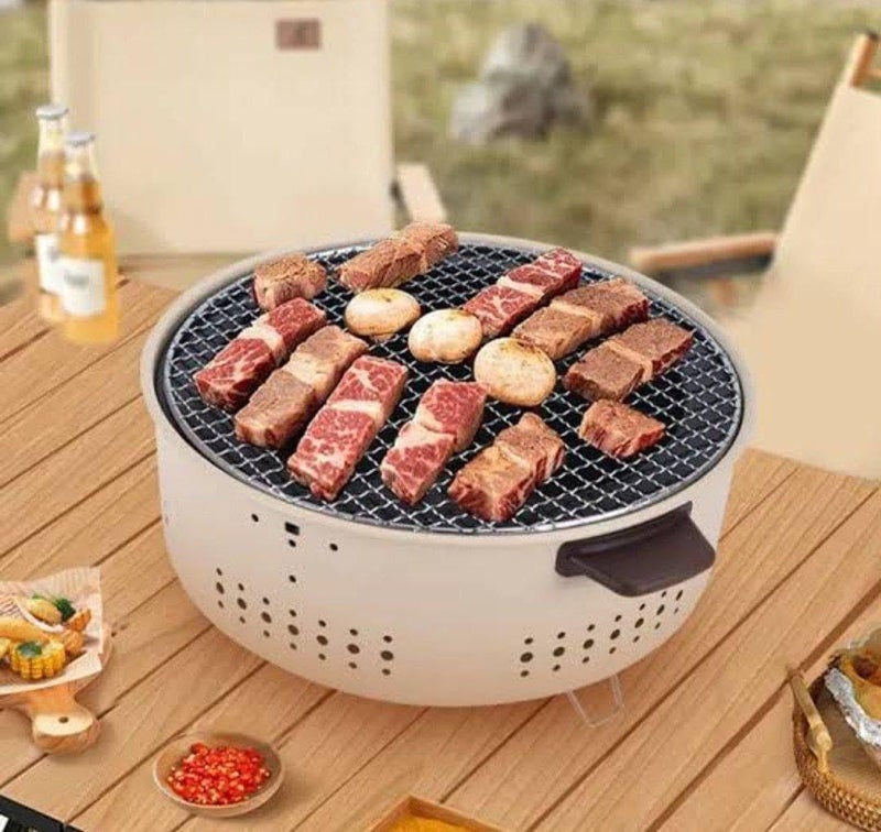 MULTI-USE GRILL - Designed for outdoors, this lightweight grill features a sturdy inner bowl and for stability, perfect for casual gatherings
