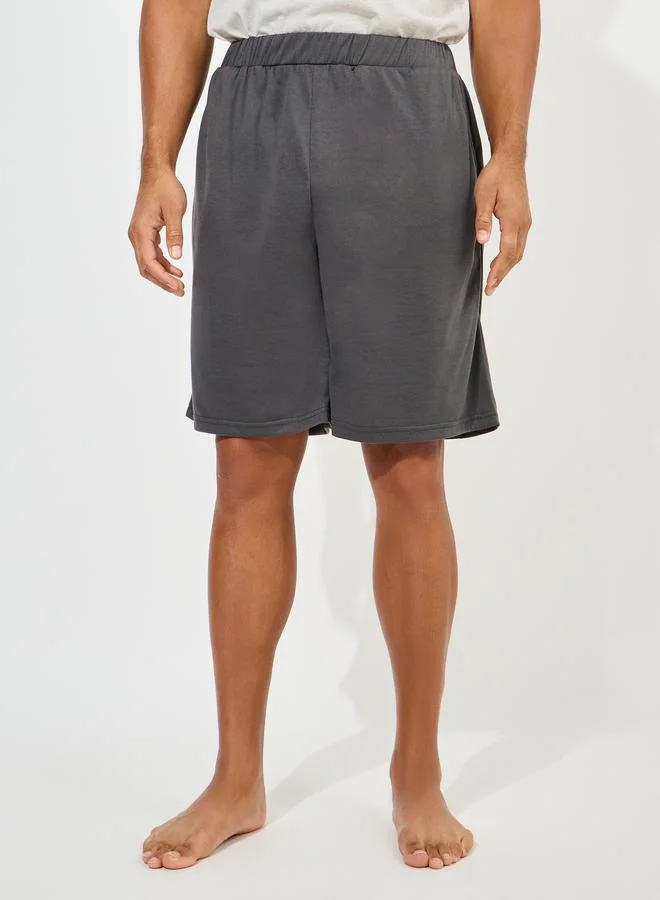 ستايلي V Neck Minimal Print T-Shirt & Cut-Sew Detail Shorts Set