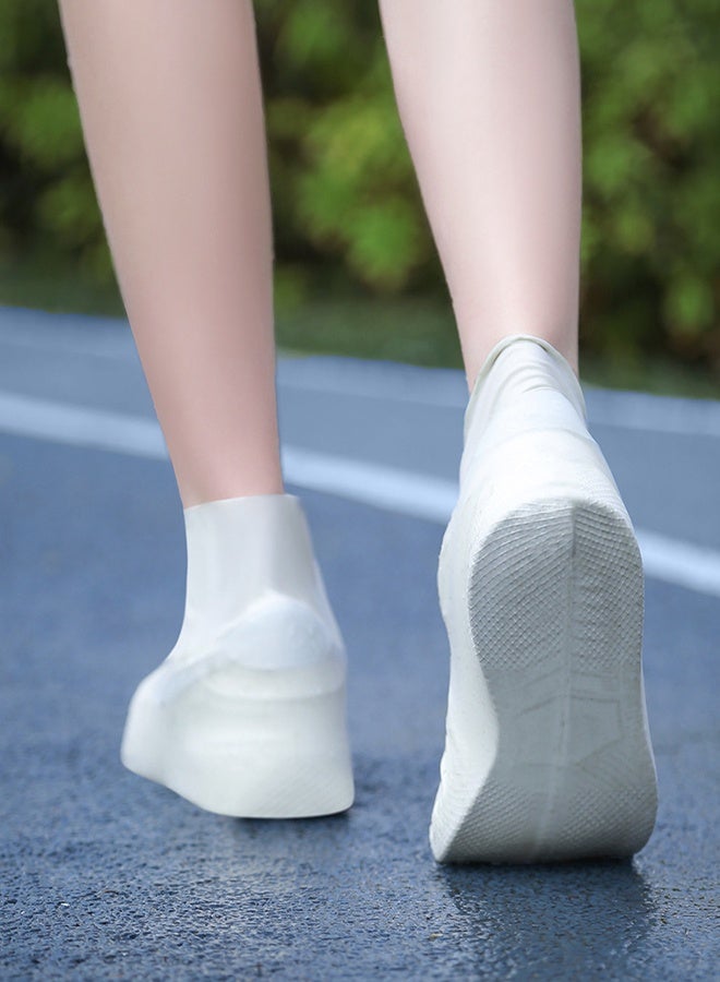MANBO These 2 pairs of white latex shoe covers are waterproof, slip-resistant, snow-proof and mud-proof with excellent durability. They effectively keep shoes clean and dry, making them perfect for gardening, rainy days, snowy weather and messy outdoor environments. - Image 3