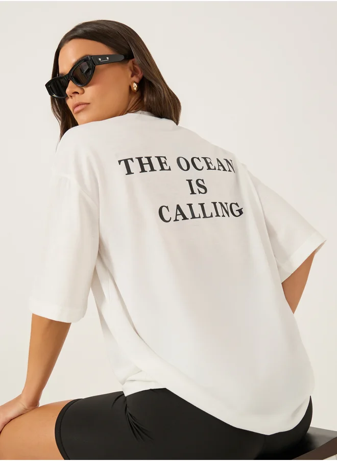 Styli Slogan Print Short Sleeve Oversized T-Shirt