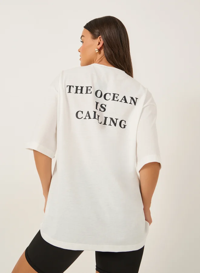 Styli Slogan Print Short Sleeve Oversized T-Shirt