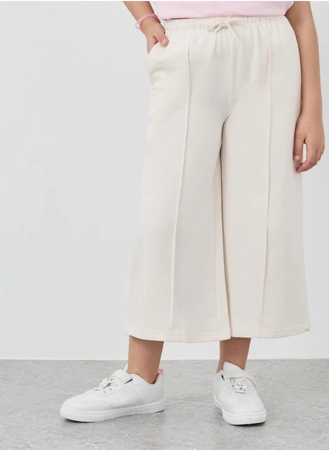Styli Styli Girls Beige Solid Pintuck Wide Leg Culottes