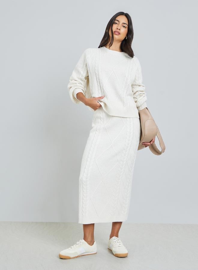 ستايلي طقم منسق من تنورة وكنزة محبوكة - Image 1