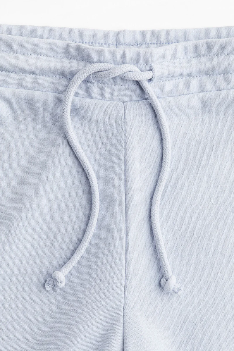 اتش اند ام بنطلون رياضي بحافة واسعة