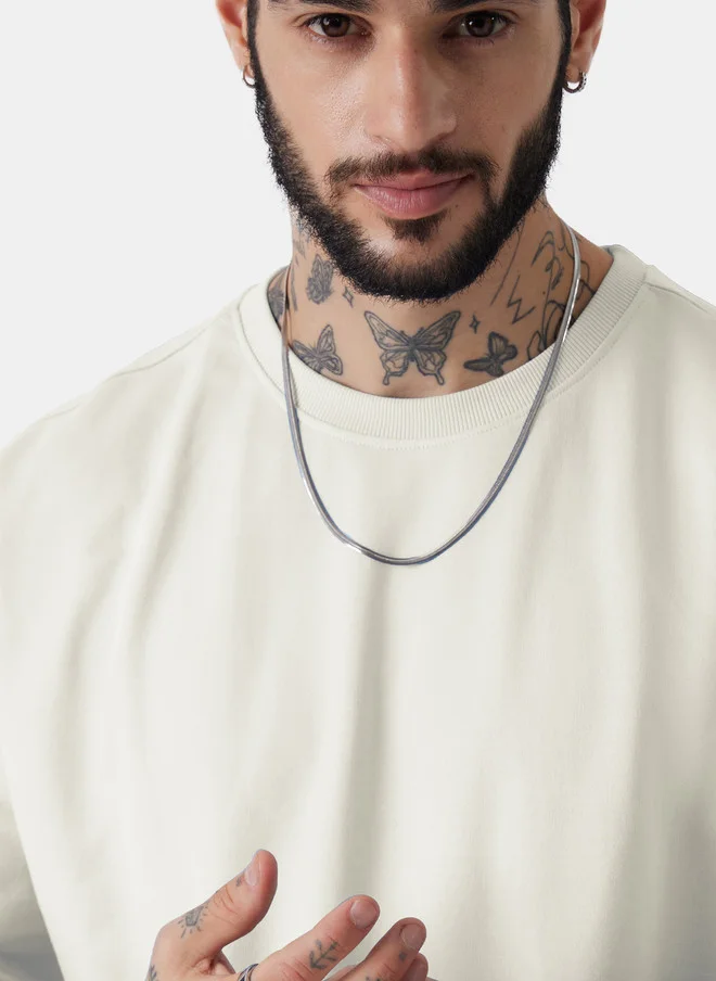 The Souled Store  The Souled Store Men Oversized Solid Eggshell White T-Shirt  | Best Price UAE