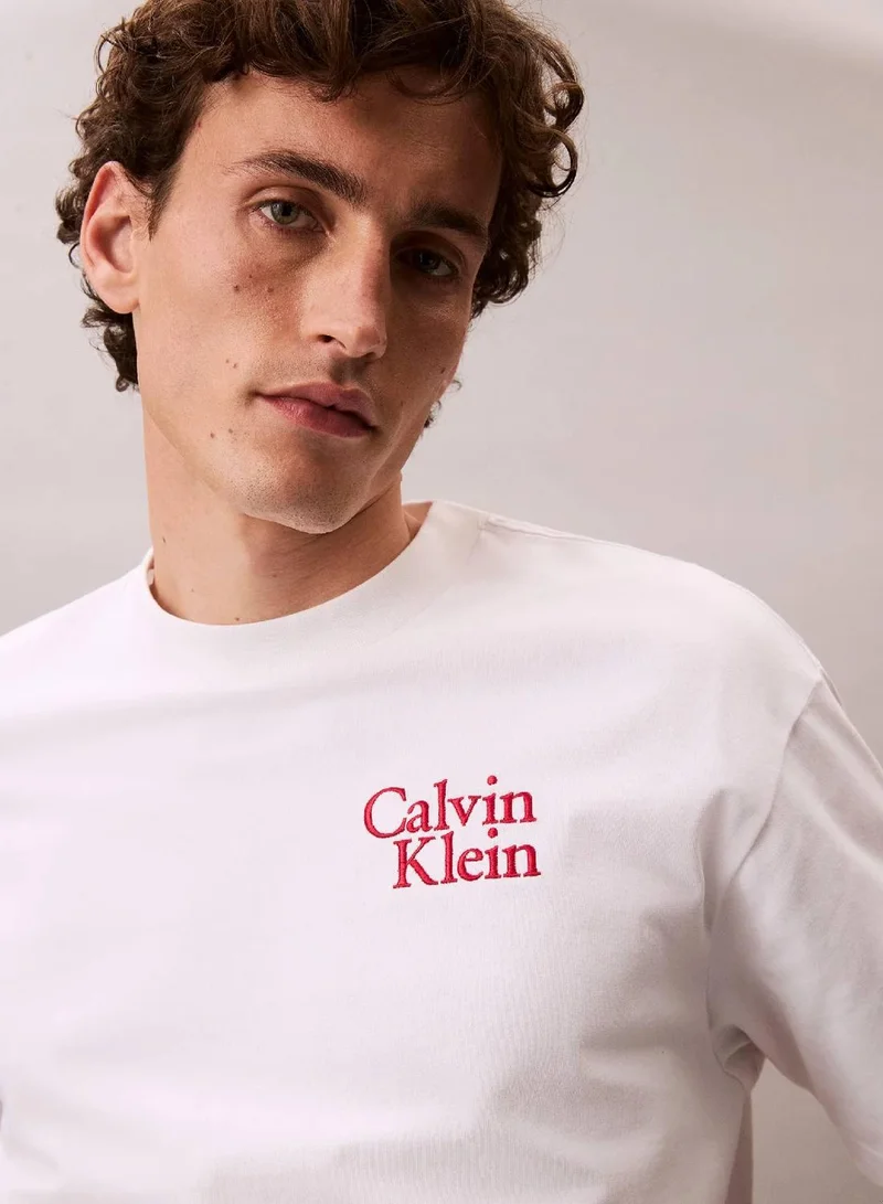 Calvin Klein Jeans Brilliant White Script Logo Graphic Relaxed T-Shirt for Men | Best Price UAE