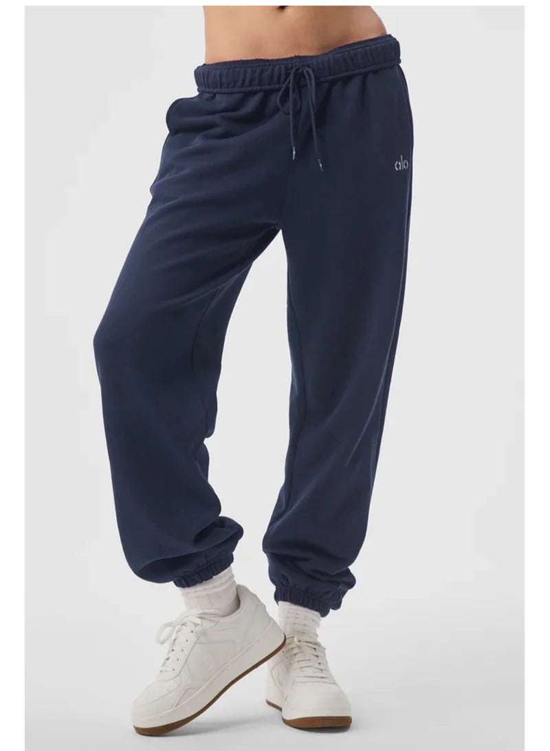 ALO Loose ankle-length cotton pants, sporty and casual, comfortable and deep blue in color.