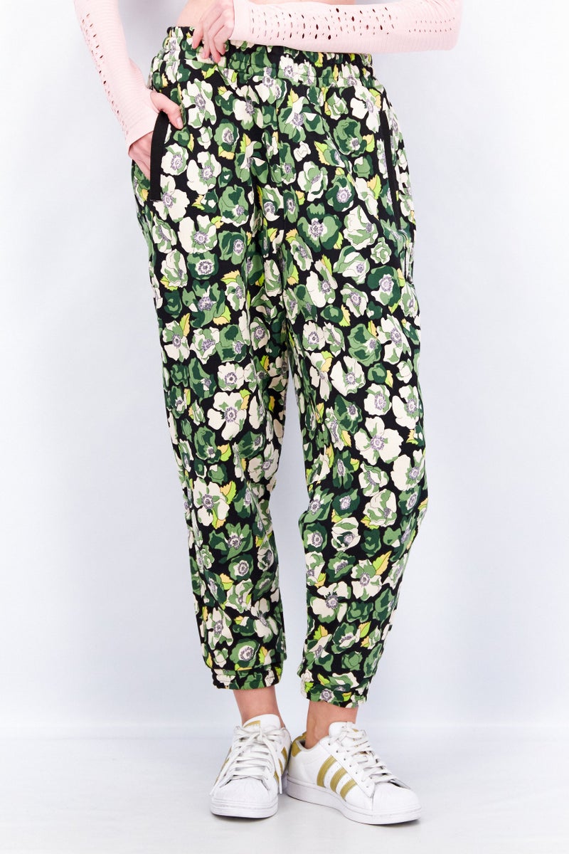 PUMA Women Sportswear Fit Floral Print Training Sweatpants, Green Combo - Image 1