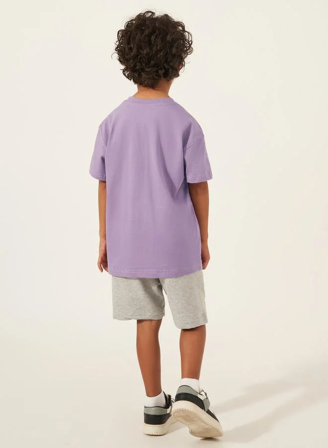 Styli Solid Oversized T-Shirt with Badge Detail