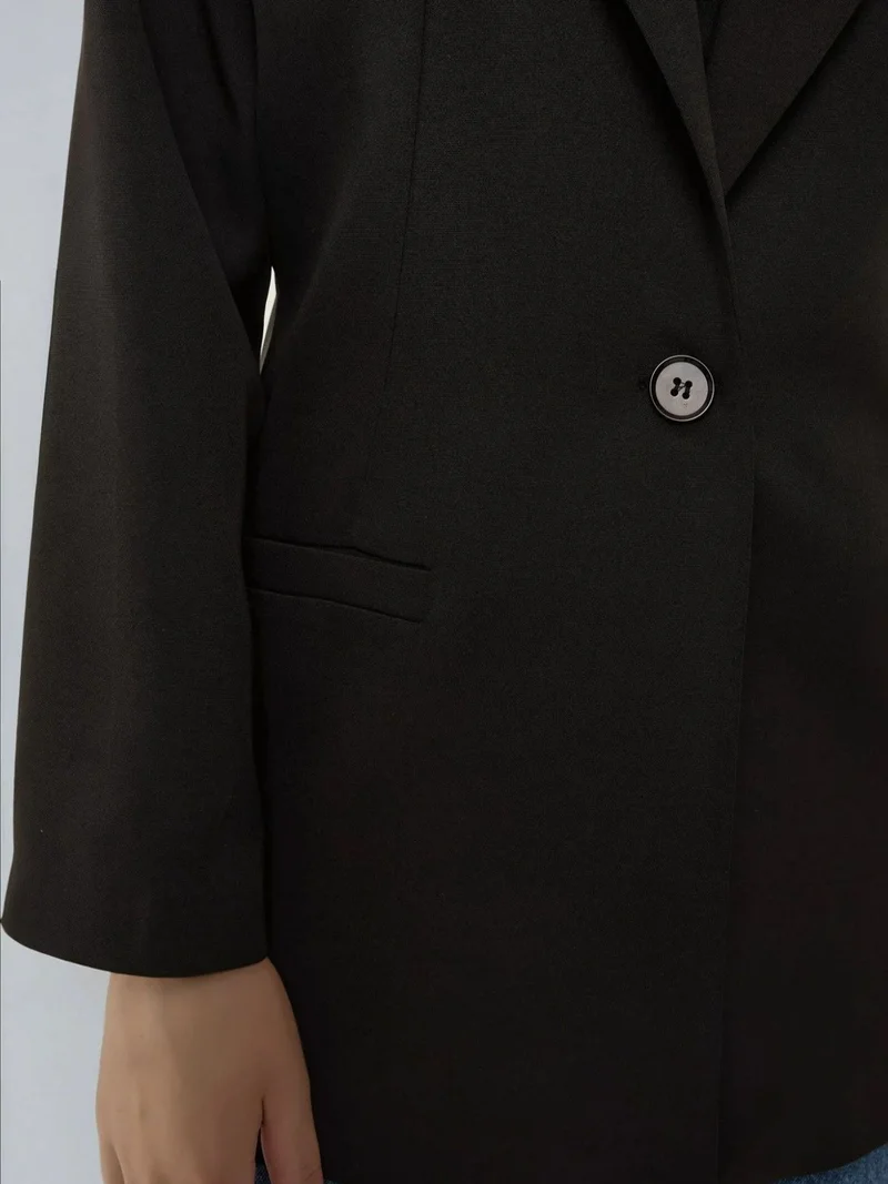 زوبعة جاكيت بليزر ببطانة جلد الفهد