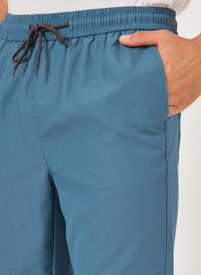 Take Two Solid Drawstring Waist Relaxed Fit Joggers by Styli
