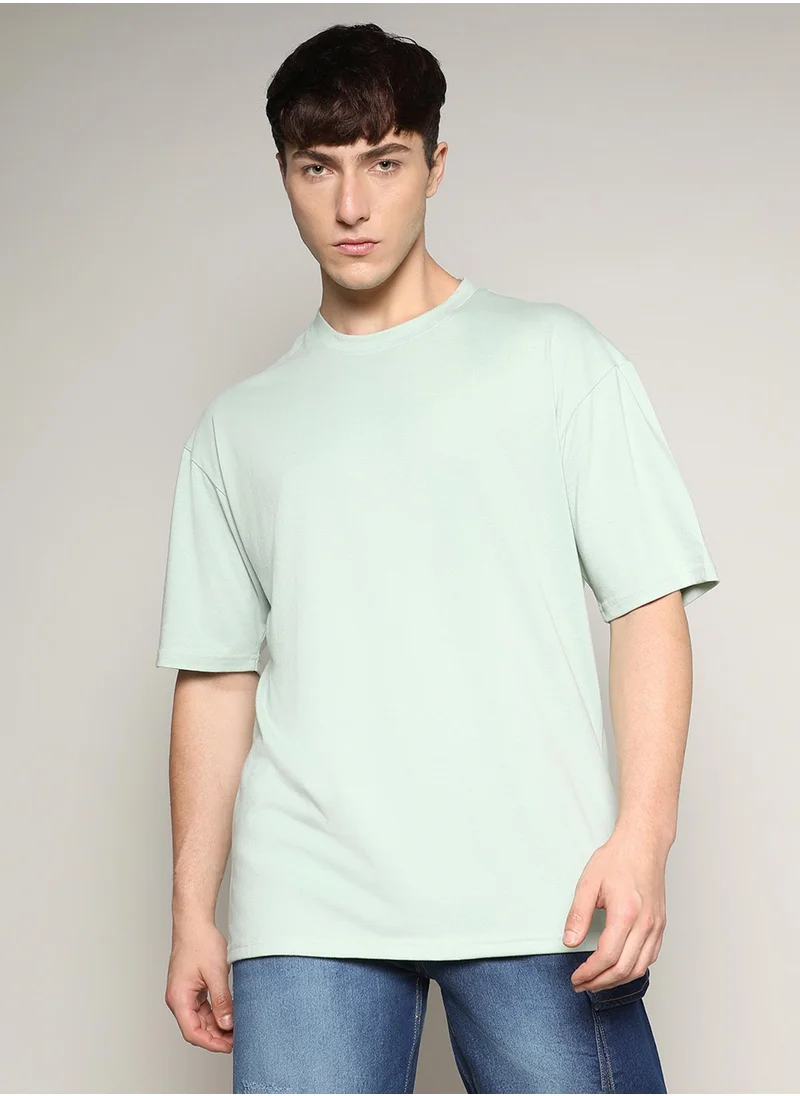 Campus Sutra Campus Sutra Men's Tea Green Basic Oversized T-Shirt For Casual Wear | Crew Neck | Short Sleeve | Pull On Closure | T-Shirt Crafted With Comfort Fit For Everyday Wear