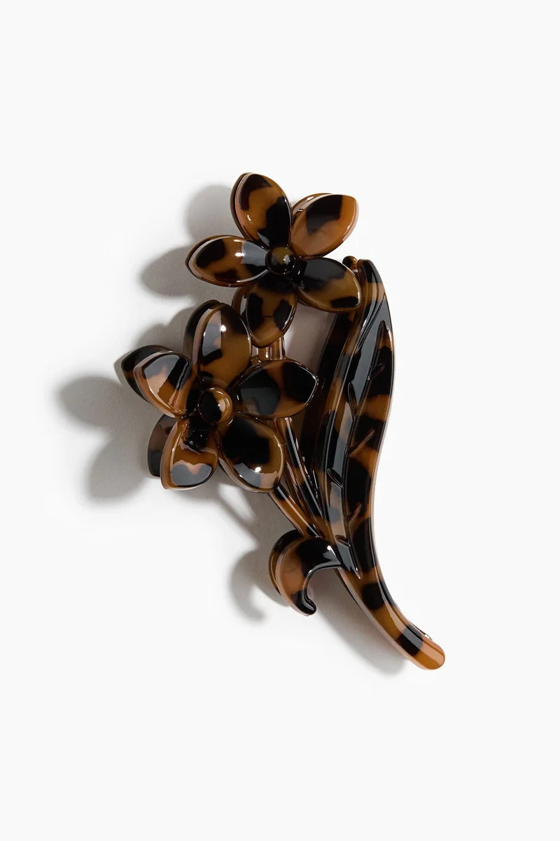 اتش اند ام مشابك شعر بشكل زهرة