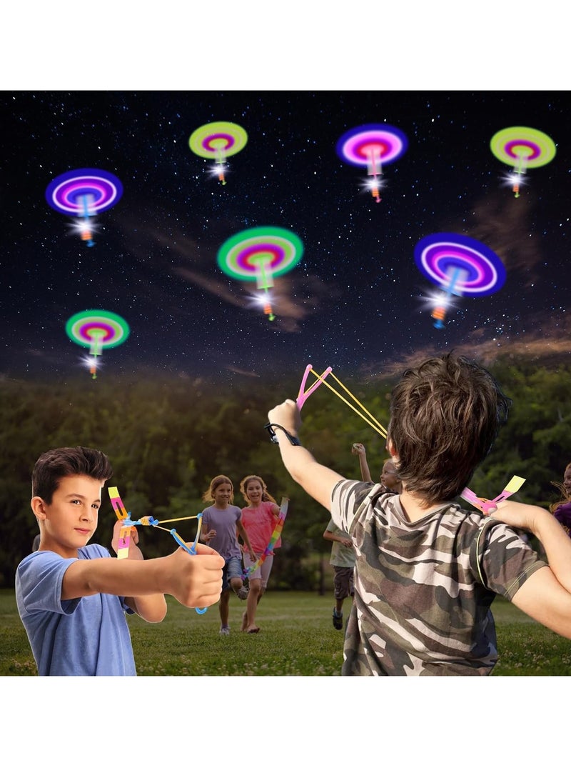 ARGT 12 PCS LED Light Flying Toy Party Set – Slingshot Rocket Helicopter, Glow in the Dark Jumping Toy for Kids, Outdoor Night Game, Party Bag Fillers, Birthday Gifts,  Stocking Fillers  - Image 4