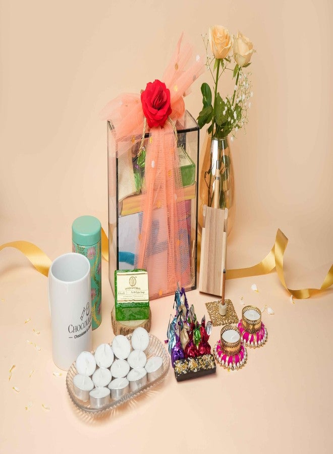 Chocolights Office Essential diwali hamper | Diwali Gift | 1. Homemade Chocolates in a potli- 08, 2. Mug-1, 3. Mix Dryfruits in a Tin Jar- 150g, 4. Decorative diyas- 2, 5. Bubble candle- 1, 6. Dryfruit chocolate bar-1, 7. Khadi Soap-1, 8. Dhup Sticks-1, 9. Pen Stand-1 - Image 2