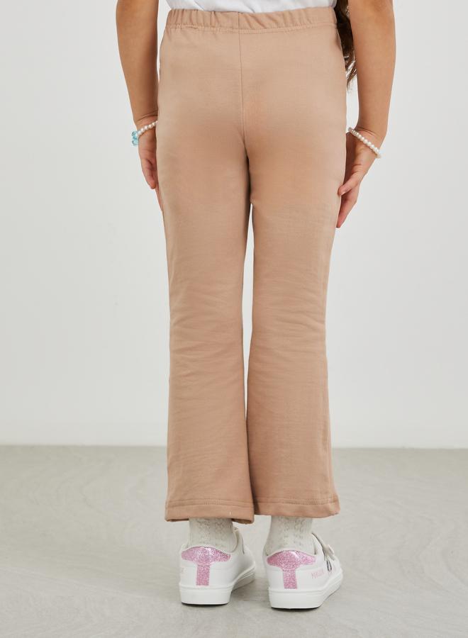 Styli Girls Beige Solid Pin Tuck Flared Leggings - Image 4