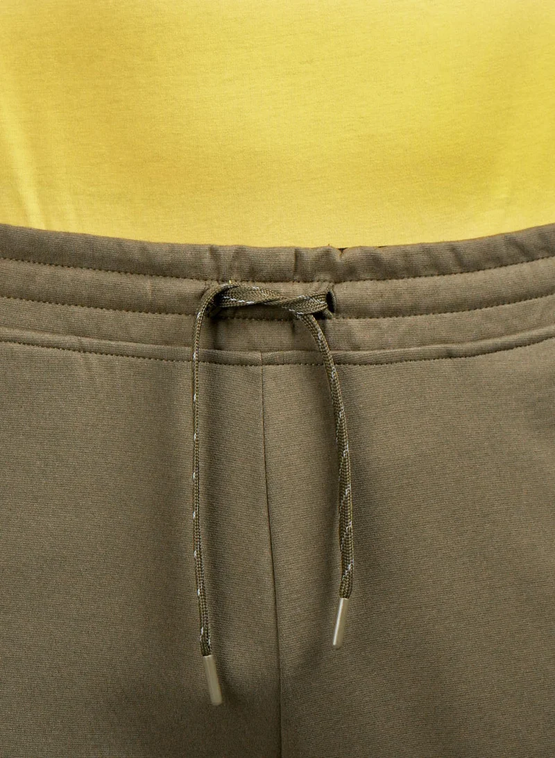 GIORDANO  Men's Slim Tapered Fit Jogger Pants for Men | Best Price UAE