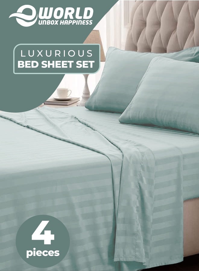 إي وورلد مجموعة فاخرة مكونة من 4 قطع لسرير ملكي باللون أخضر باستيل المخطط تتضمن 1 غطاء لحاف (220x240 سم)، 1 شرشف سرير مطاطي (200x200+30 سم)، و 2 حالة وسادة (48x74+5 سم) لتجربة أناقة فاخرة مستوحاة من الفنادق. - Image 1